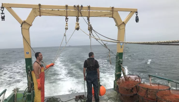 aquaculture people on a boat 